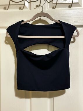 Elegant Navy Cutout Women's Top - Sleeveless Contemporary Design